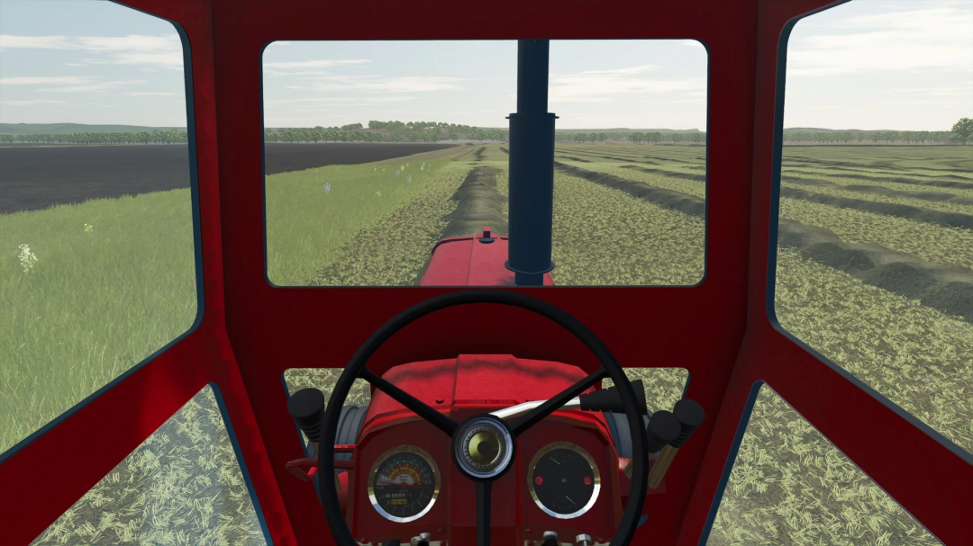 View from inside the International 856 tractor mod in Farming Simulator 25, showing the field ahead.