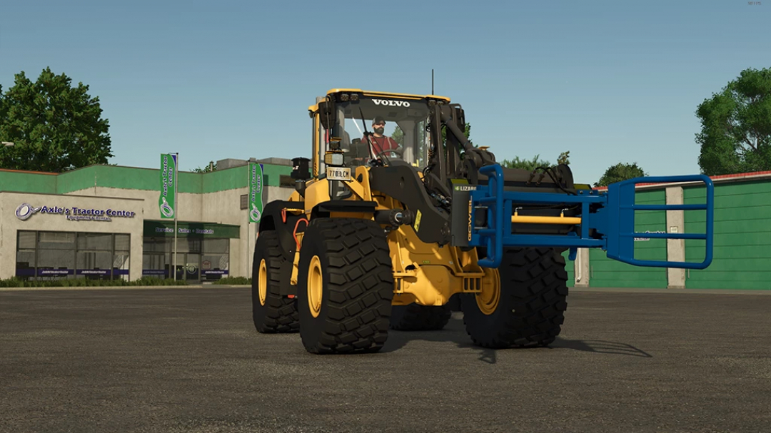 Lizard Wheel Loader Adapter mod for FS25 featuring a yellow wheel loader in front of Axle's Tractor Center.