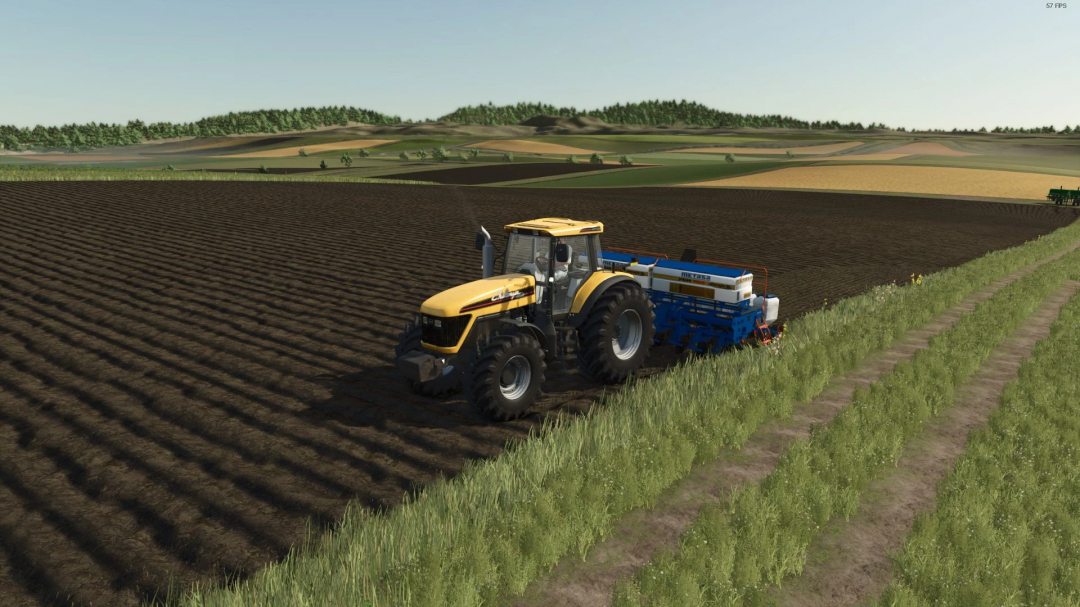 Yellow tractor using METASA PDM v1.0.0.0 mod on a farm in FS25, surrounded by green fields.