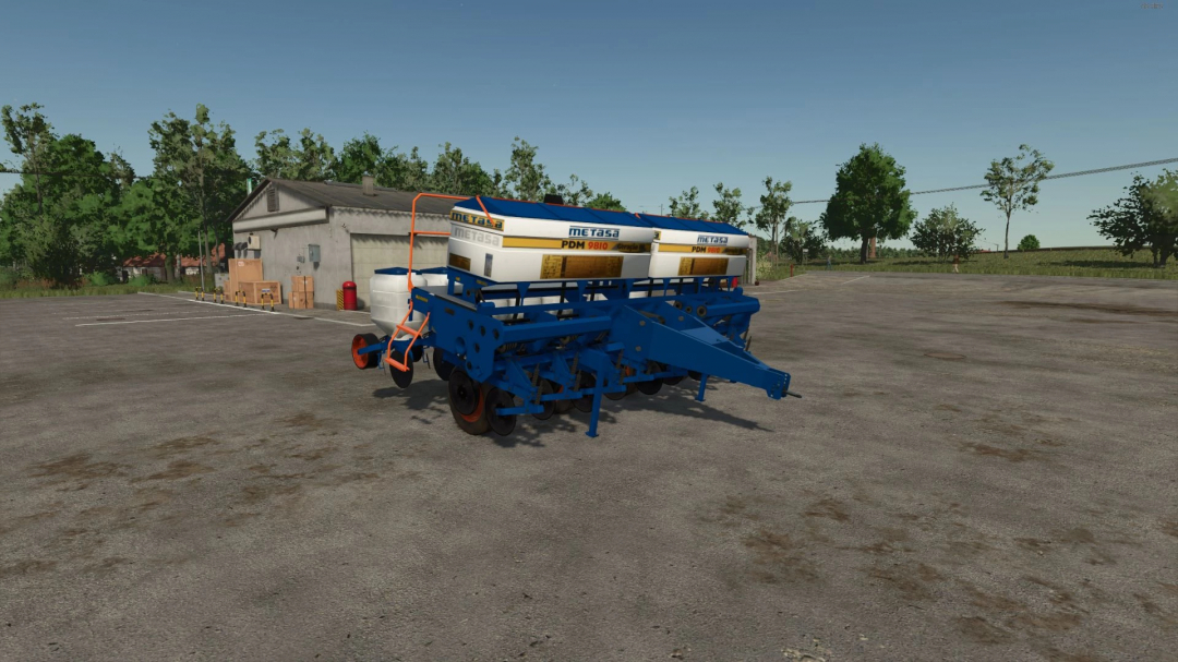 FS25 mod METASA PDM v1.0.0.0, showcasing a blue agricultural planter with white tanks on a farmyard.