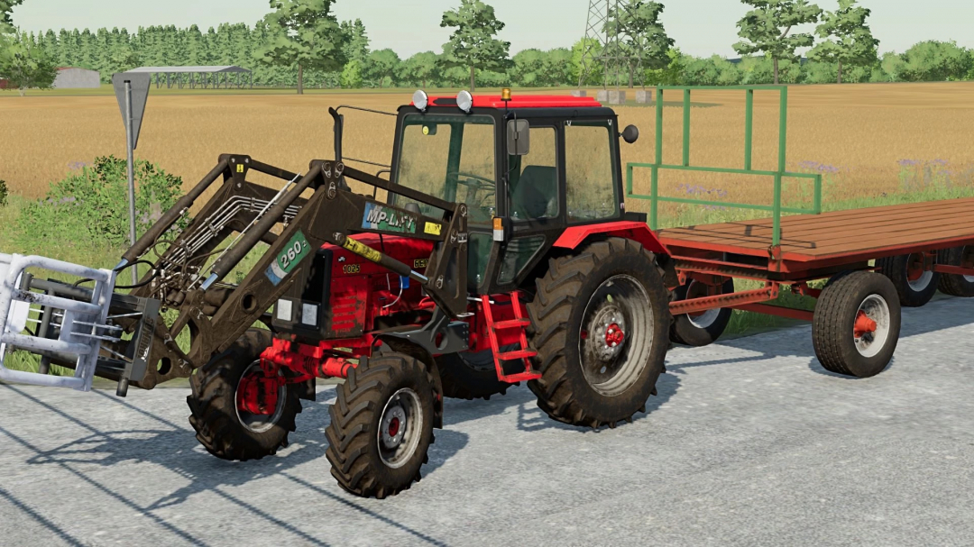 FS22 mod MTZ-1025 Now v1.0.0.0, featuring a red tractor with a front loader and trailer on a farm road.