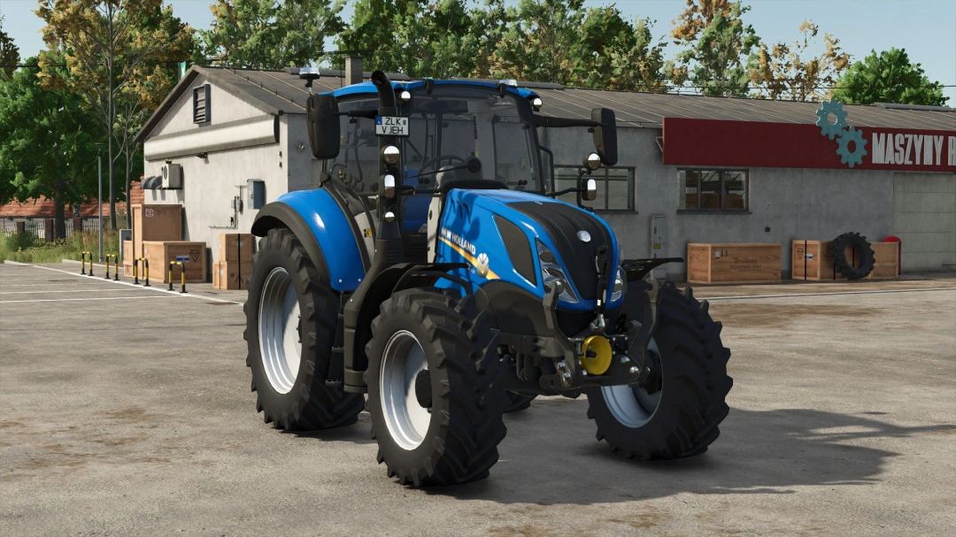 FS25 mod New Holland T5 v1.1.0.0 tractor parked in front of a warehouse.