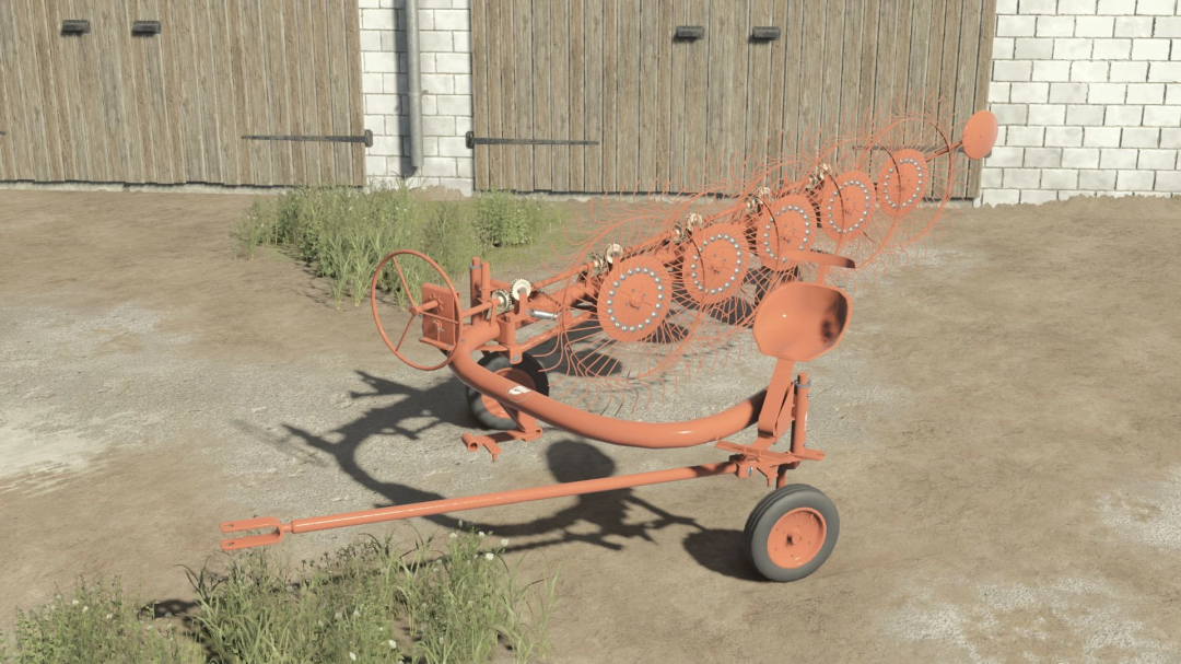 Orange PZK 7/6/5 Pack mod from FS25 displayed on a farm ground.