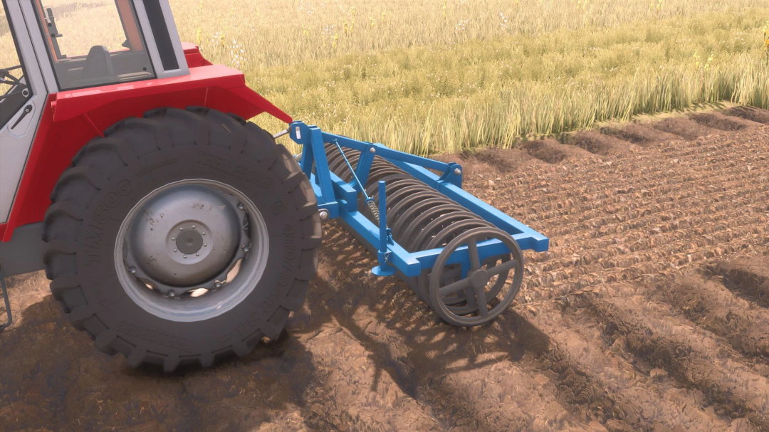 Farming Simulator 25 mod: Rabe Discotass 3000 v1.0.0.0 attached to a red tractor working on a field.