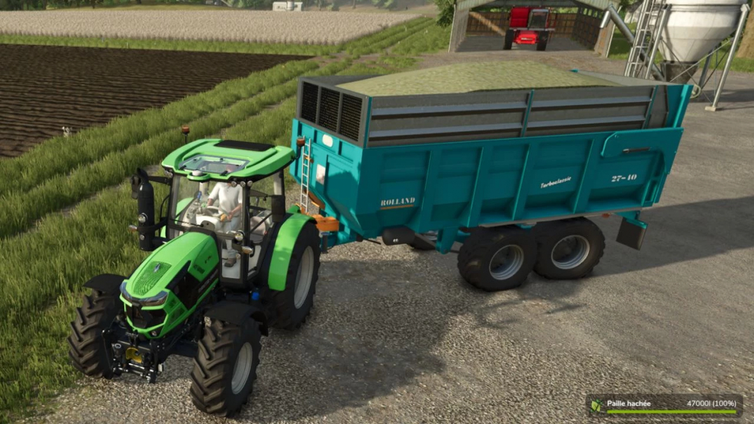 FS25 mod Rolland Turboclassic 27-40 tractor with trailer in field.