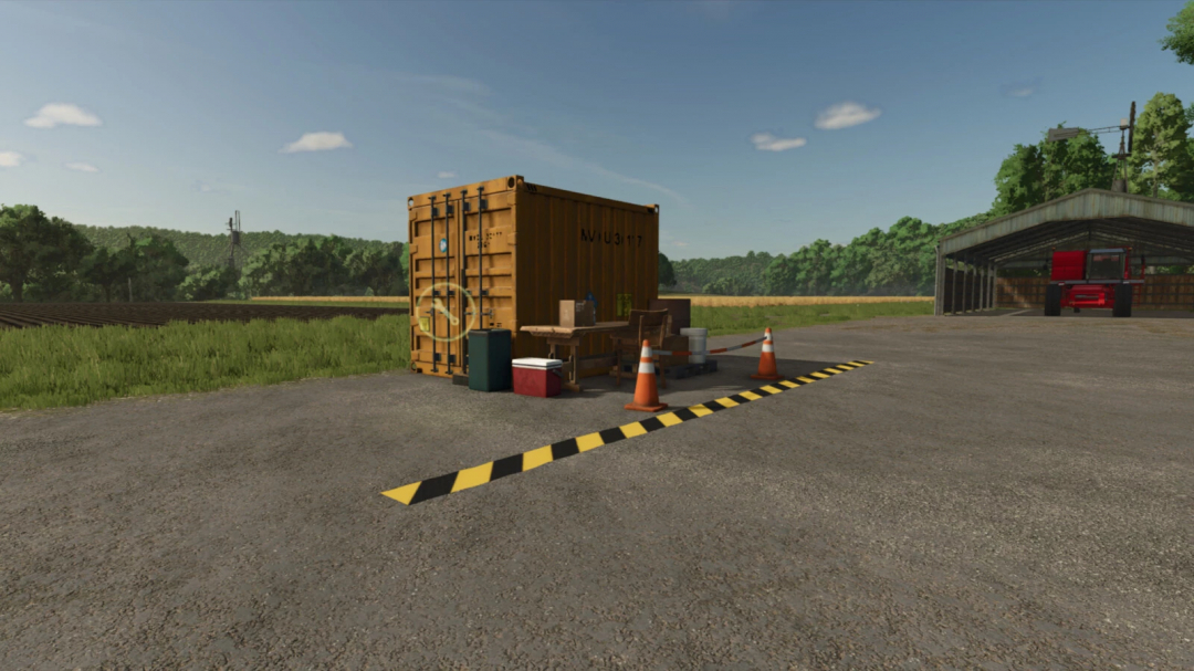 FS25 mod Small Container Workshop v1.0.0.0 in a farm setting with an orange container and tools outdoor.