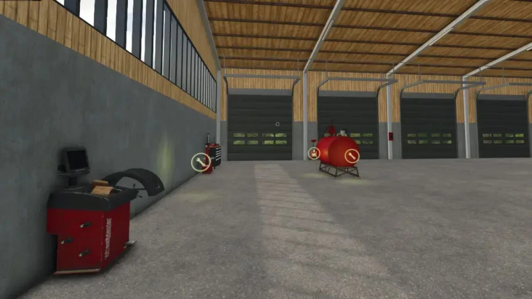 Interior view of storage hangars in FS25 mod, featuring tools and equipment in a spacious area.