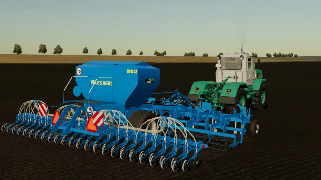 Veles Agro 6M seeder attached to a tractor in FS22 mod, Farming Simulator 22.