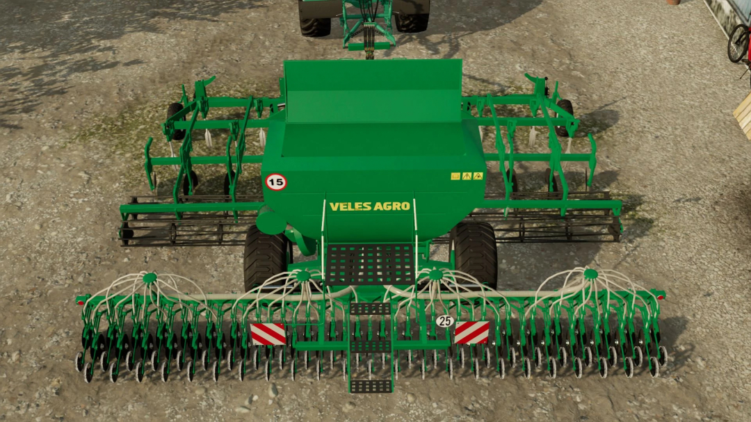 FS22 mod Veles Agro 6M v1.0.0.0, a green agricultural machine with wheels, set on a gravel surface in Farming Simulator 22.