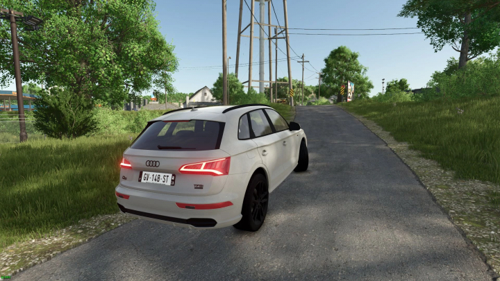 fs25-mods,  Audi Q5 T.F.S.I. 2020 mod in FS25, driving on a rural road with lush greenery.