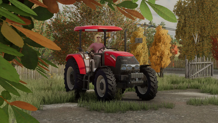 fs22-mods,  Case IH JXE Series tractor mod in FS22, featuring a farmer driving it amidst an autumn landscape.