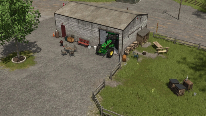 fs25-mods,  FS25 Decorative Objects Pack v1.0.0.0 featuring a tractor in a farmyard with sheds, benches, and stacked firewood.