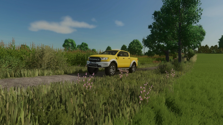 fs25-mods, Yellow Ford Raptor 4x4 mod in a scenic FS25 landscape.