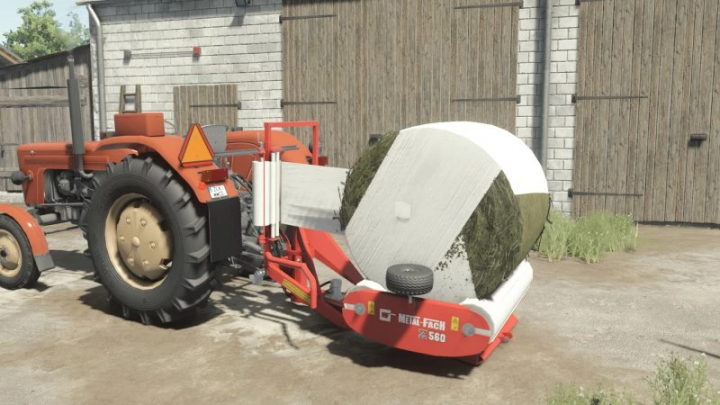 fs25-mods,  FS25 mod: Metal-Fach Z560 baler in Farming Simulator 25, attached to a tractor.