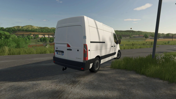 fs25-mods,  Renault Master III mod in FS25, parked on a rural road with a scenic landscape.