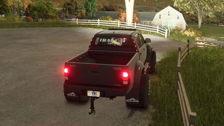 fs25-mods, Toyota Hilux AT38 Edit v1.0.0.0 mod in FS25, featuring a rugged pickup on a farm road.