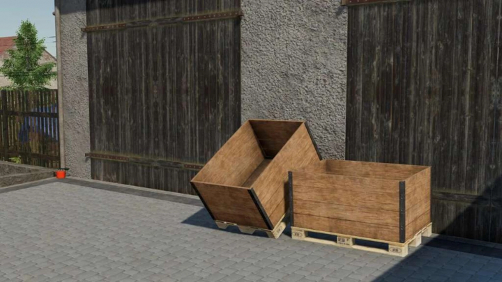 fs25-mods, Wooden pallets with boxes next to a barn, part of FS25 Unlimited Pallets mod.