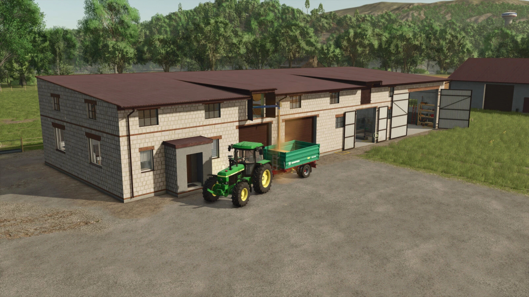 Cowshed with garage mod in FS25 featuring a tractor and trailer outside the barn.