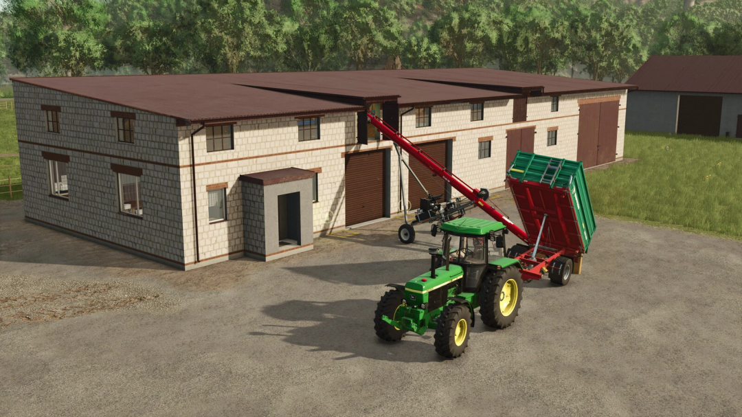 Cowshed with garage mod in FS25 featuring a tractor with a red trailer outside the barn.