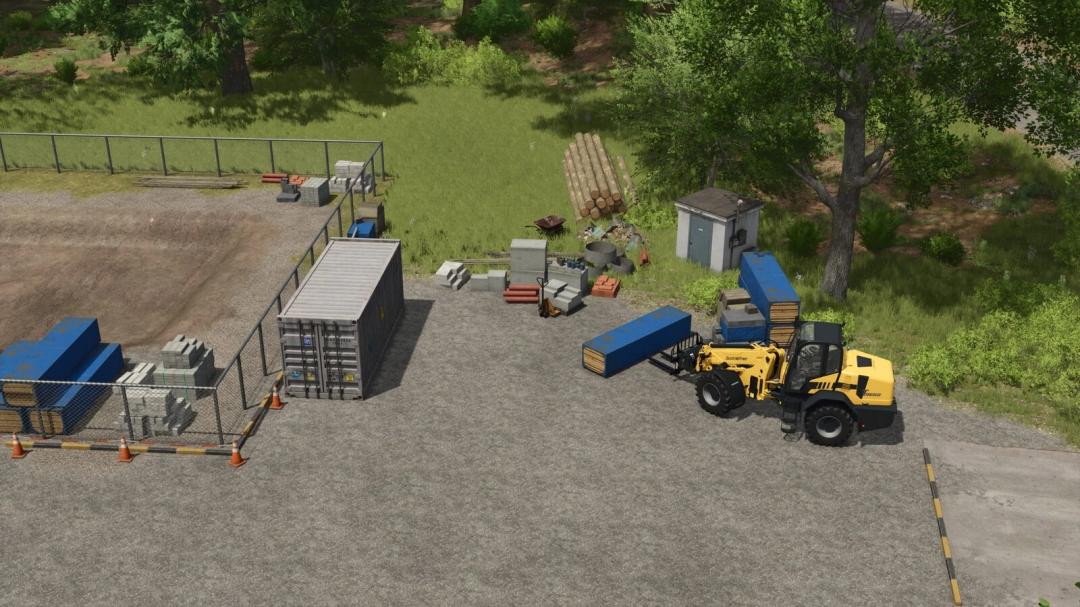 FS25 Decorative Objects Pack v1.0.0.0: A forklift moves blue crates near construction materials in a fenced area.