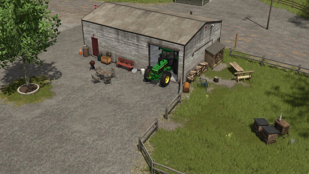 FS25 Decorative Objects Pack v1.0.0.0 featuring a tractor in a farmyard with sheds, benches, and stacked firewood.