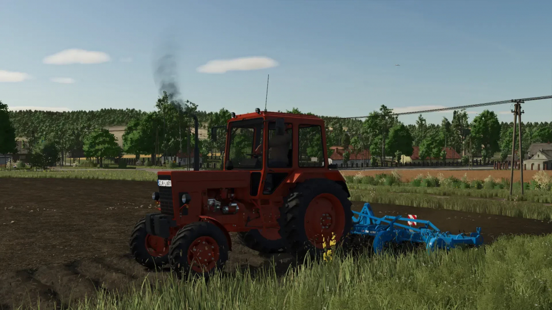 Red Fortschritt B-231 tractor and blue plow on field in FS25 mod.