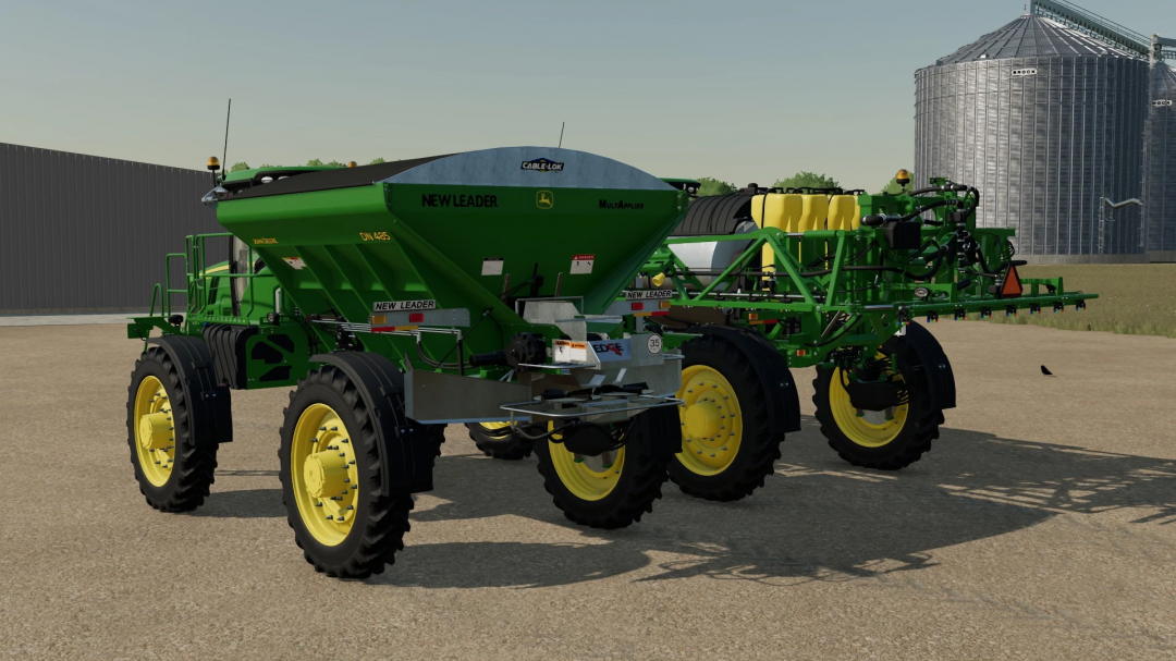 John Deere 4045R Spreader/Sprayer mod in FS25 showcasing green body and yellow wheels.