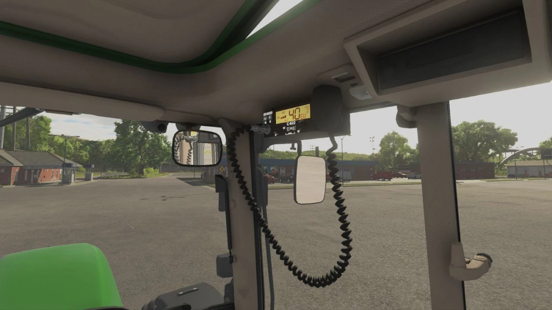 Interior of John Deere 6x20 Series tractor mod in FS25, showing dashboard and CB radio.