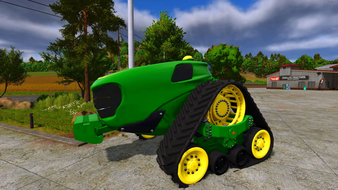 FS25 mod John Deere Electric Autonomous tractor with track wheels on a farmyard.