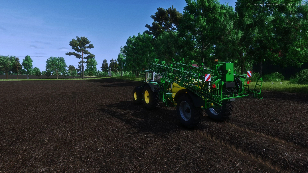 FS25 mod John Deere R700i v1.0.0.0 in a field with dense trees in Farming Simulator 25.