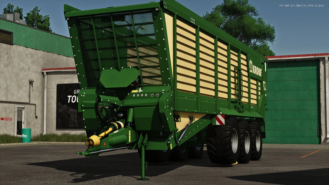 Krone TX 560 trailer mod in Farming Simulator 25, showing green and beige design in a farm setting.