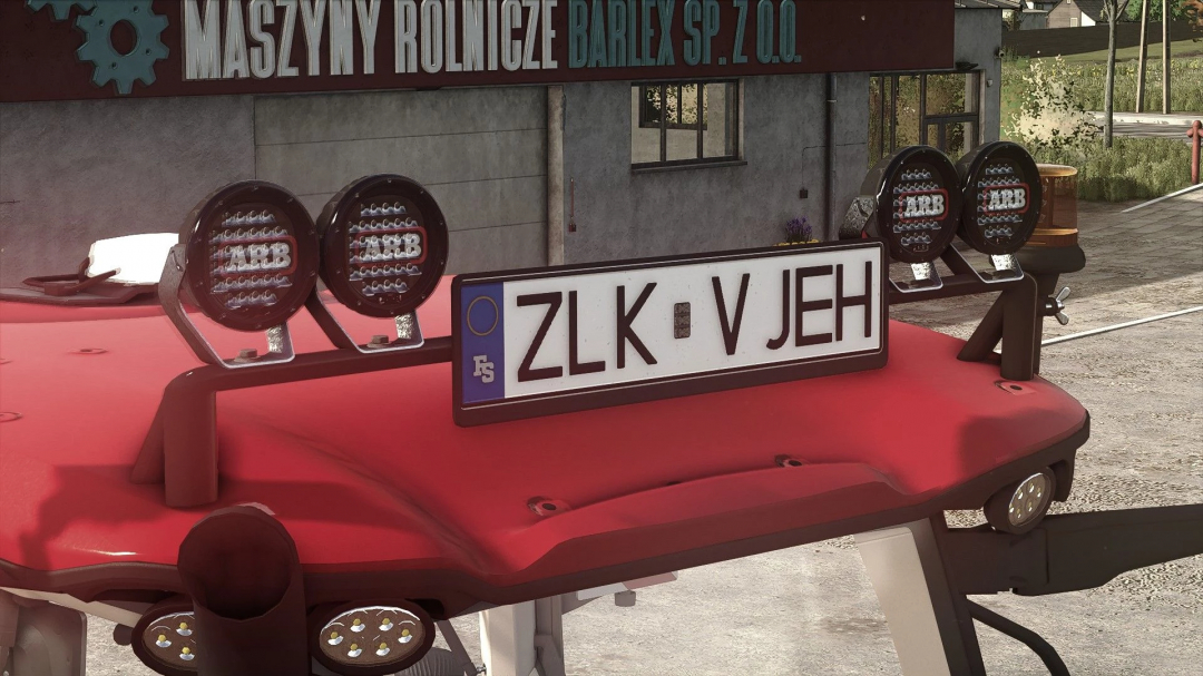 FS25 mod Lightbar Prefab v1.0.0.0 showcasing mounted lights and license plate on a red vehicle.