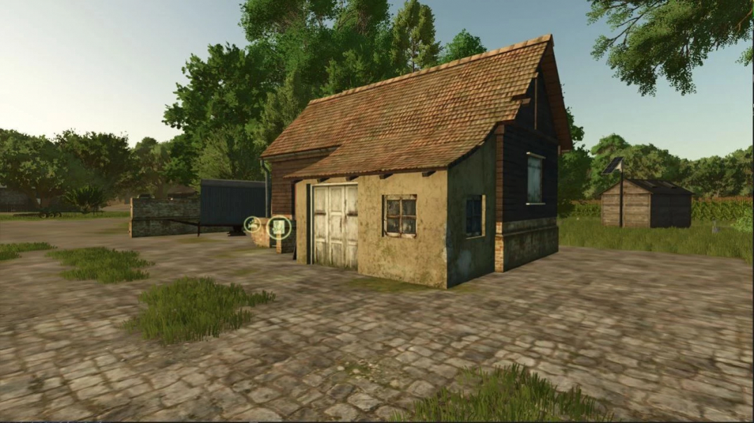 Old farmhouse mod in FS25 with rustic exterior and surrounding greenery.