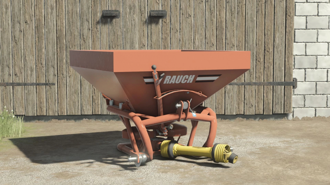 RAUCH ZSA580 mod for FS25, showcasing a red agricultural spreader against a wooden barn backdrop in Farming Simulator 25.