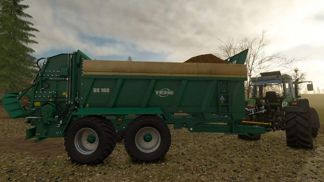 Tebbe DS 160 v1.0.0.0 mod for FS25, featuring green manure spreader attached to a tractor.