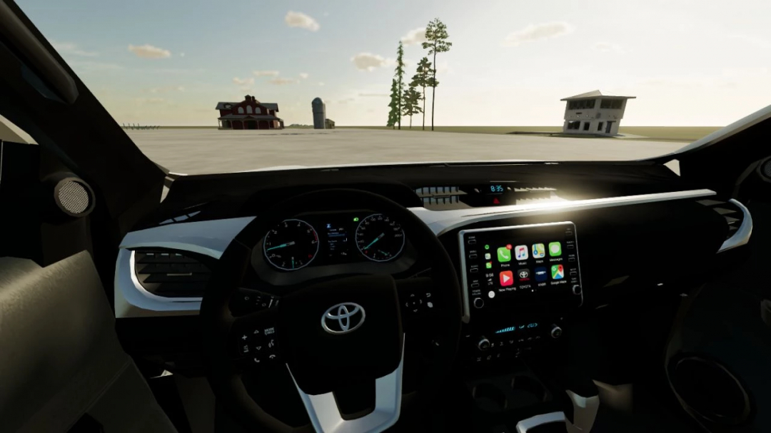 Interior view of Toyota Hilux 2022 mod in FS22, showcasing dashboard and steering wheel.