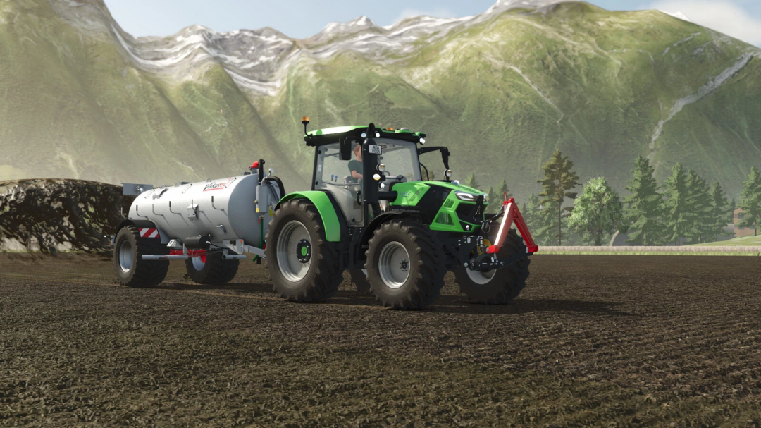 FS25 mod, Vakutec VA 8600 attached to a green tractor on a farm with mountains in the background.