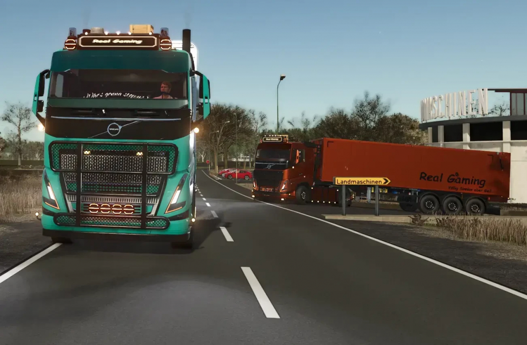 Volvo FH16 truck in FS25 mod with 'Real Gaming' trailers on a road.