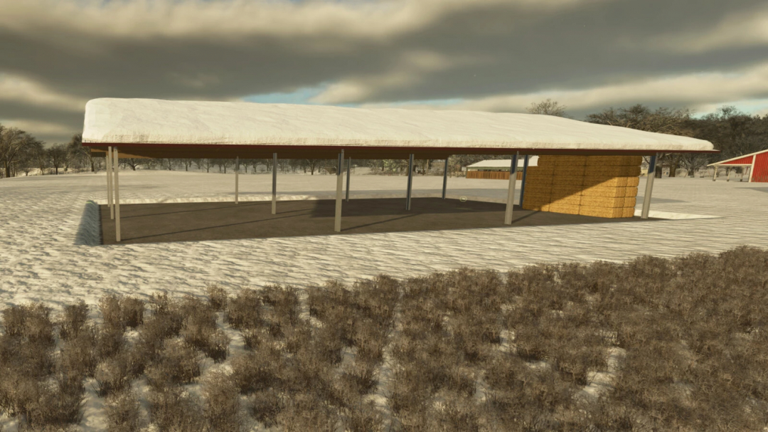 Warehouse Shelter mod in FS25 snowy landscape, featuring a large open structure with hay bales.