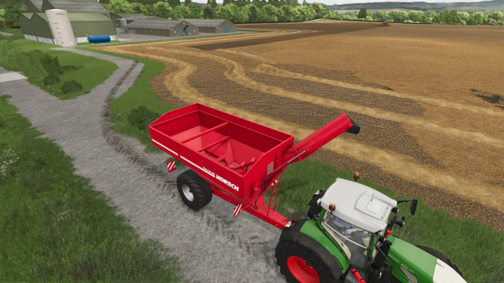 fs25-mods, FS25 mod Horsch Titan 34 UW v1.0.0.0 with a red grain cart attached to a tractor on a farm in Farming Simulator 25.