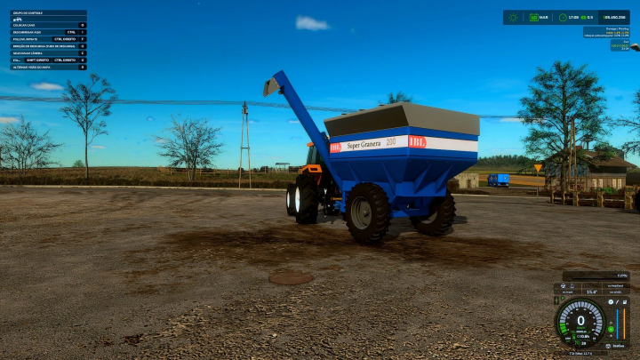 fs25-mods,  IBL Granera 200 mod in FS25 featuring a blue grain trailer attached to a tractor, set against a rural backdrop.