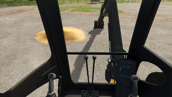 fs25-mods, FS25 mods: View from inside John Deere 50G excavator showing controls and arm with a pile of grain outside.