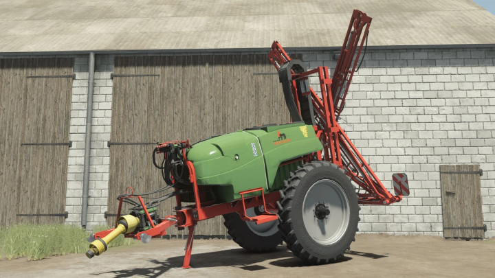 fs25-mods,  KFMR Krukowiak Apollo 1000/15/PHX mod in FS25, featuring a green and red agricultural sprayer beside a barn.