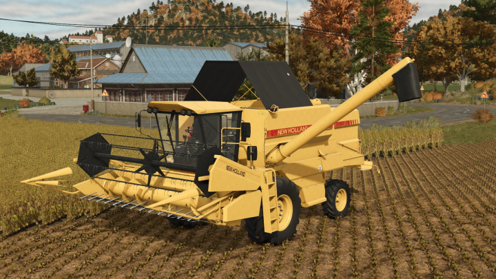 fs25-mods, New Holland TX 32 harvester in FS25 mod on a field with trees and buildings in the background.