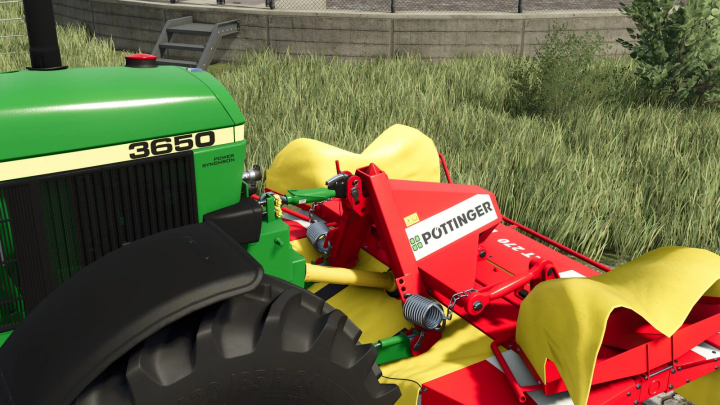 fs25-mods,  FS25 mod Sauter Tractor Triangle v1.0.0.1 attached to a tractor in green and yellow, showcased in a field.