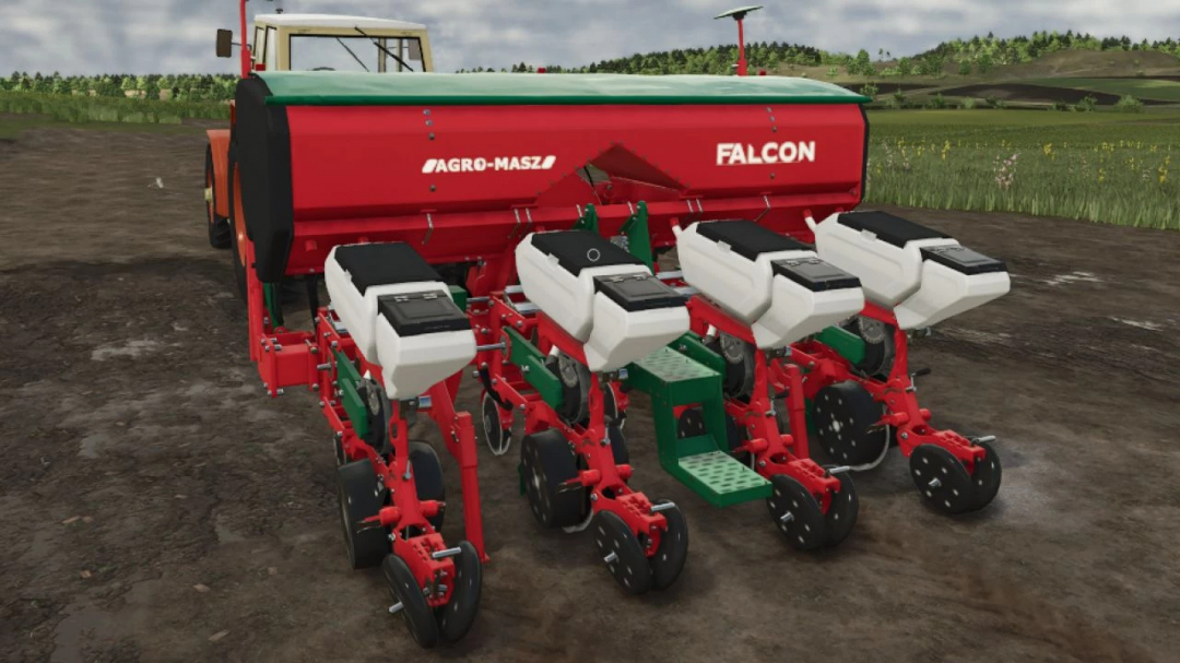 The Agromasz Falcon 3 mod in Farming Simulator 25, featuring a red and green seed drill on a field.