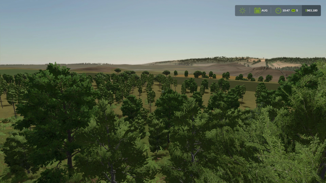 Scenic view of lush green trees in Back Yonder Acres mod for FS25, showcasing the natural landscape and forestry.