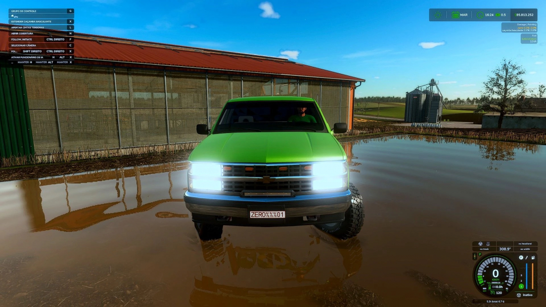 Green Chevrolet Silverado v1.0.0.0 mod in FS25 near a farm building, surrounded by muddy water.