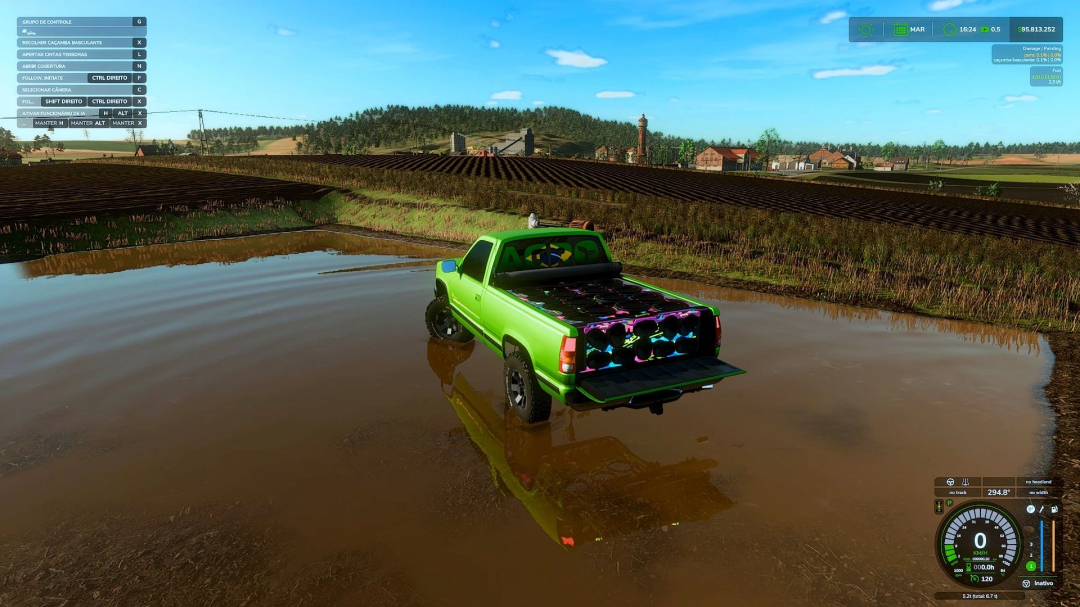 FS25 mods Chevrolet Silverado v1.0.0.0 in Farming Simulator 25, parked in a field puddle with a scenic countryside background.