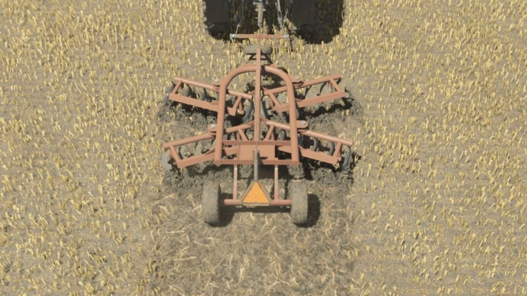 Disc Harrow 2.7m v1.0.0.0 mod in Farming Simulator 25, with a harrow cultivation tool being used on a wheat field.